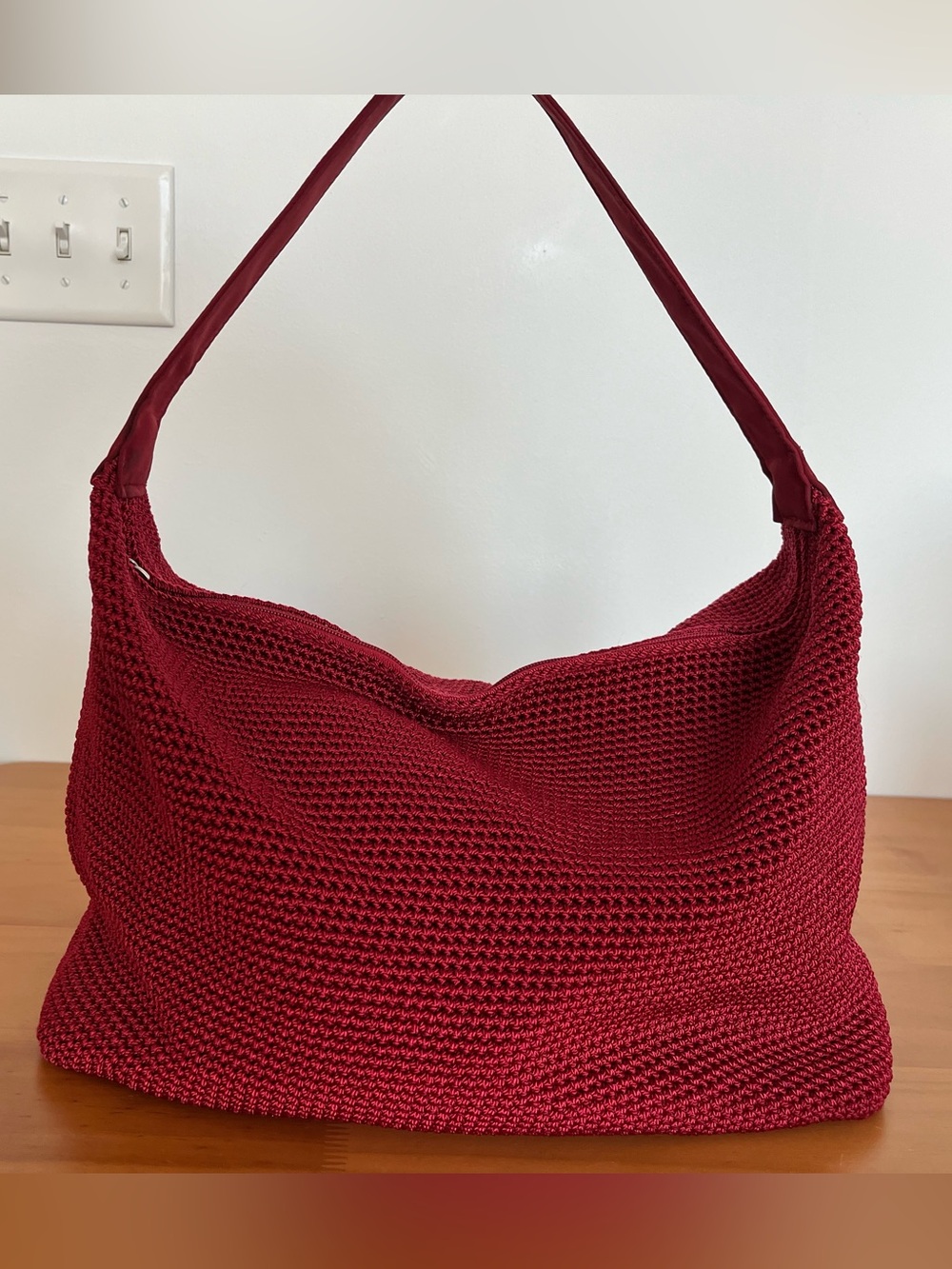 Red slouchy over the shoulder bag